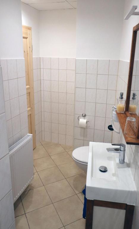 Koupelna v ubytování Gästezimmer zum rotem Karpfen