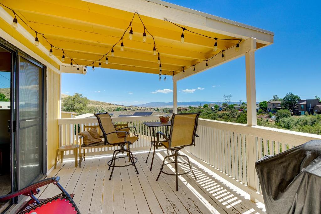 a patio with chairs and a table on a deck at Prescott Home with Views - Pets Welcome! in Prescott