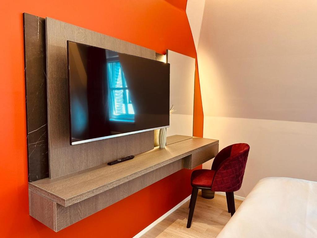 TV a/nebo společenská místnost v ubytování MEA HOTEL TRIER
