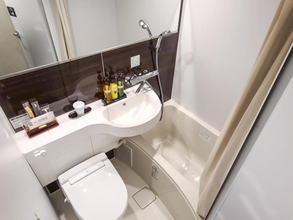 Koupelna v ubytování Hotel Livemax Premium Nagano Ekimae