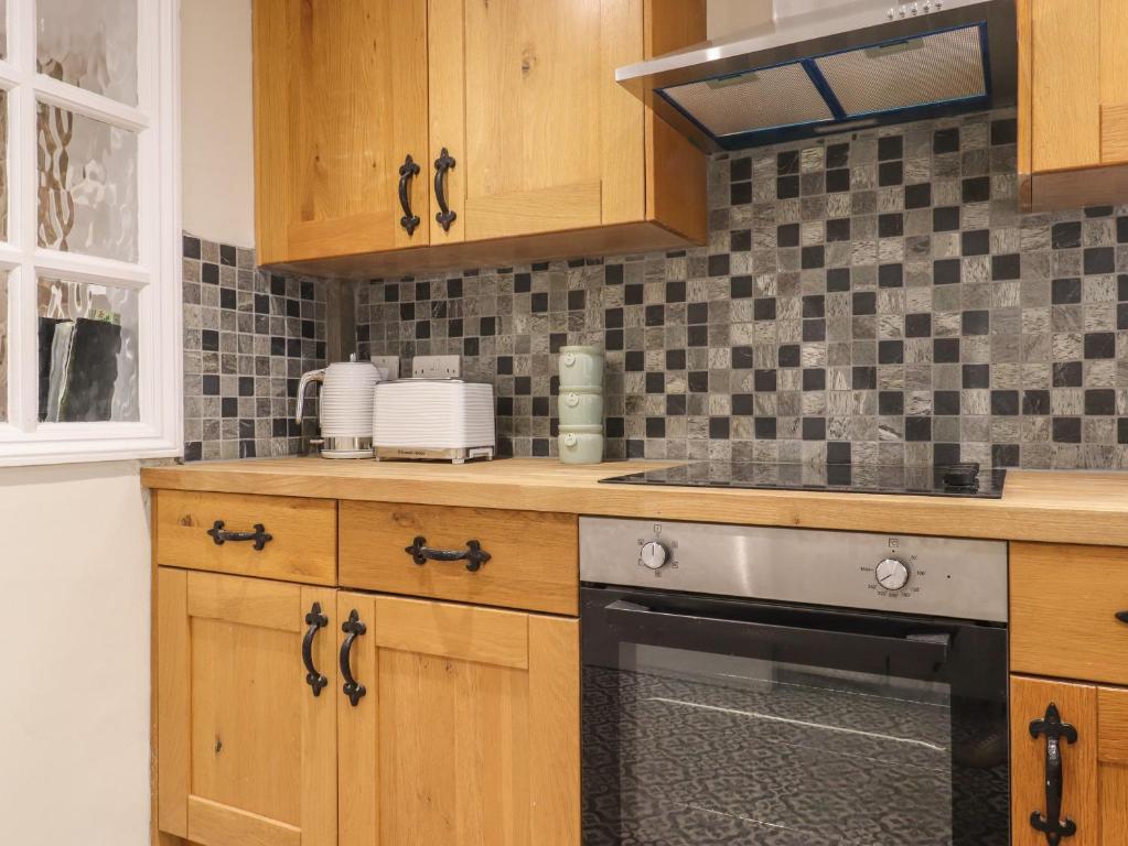 Kuchyň nebo kuchyňský kout v ubytování Star Cottage