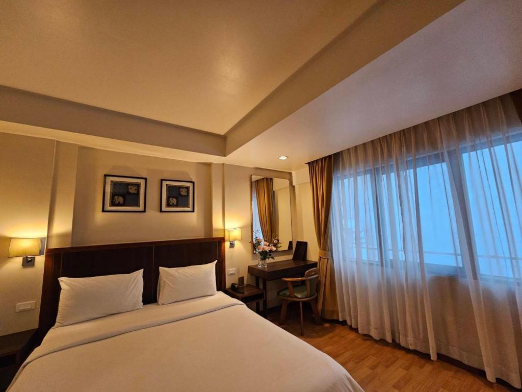 تصویر اتاق‌های Dynasty Inn - تصویر ۲