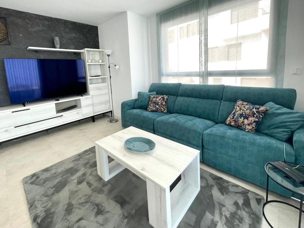 TV a/nebo společenská místnost v ubytování SEASCAPE LUXURY APARTMENT
