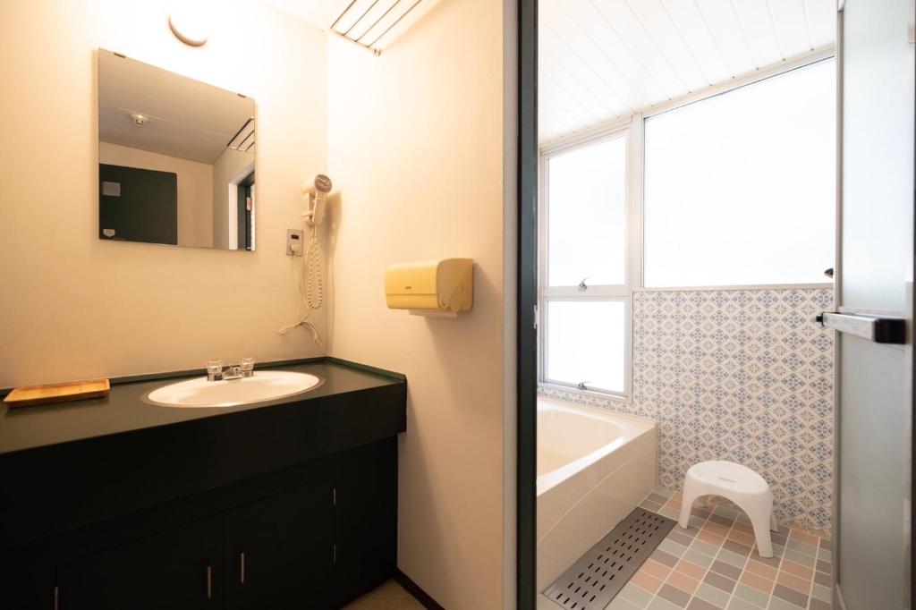 Koupelna v ubytování B&B Retreat志摩