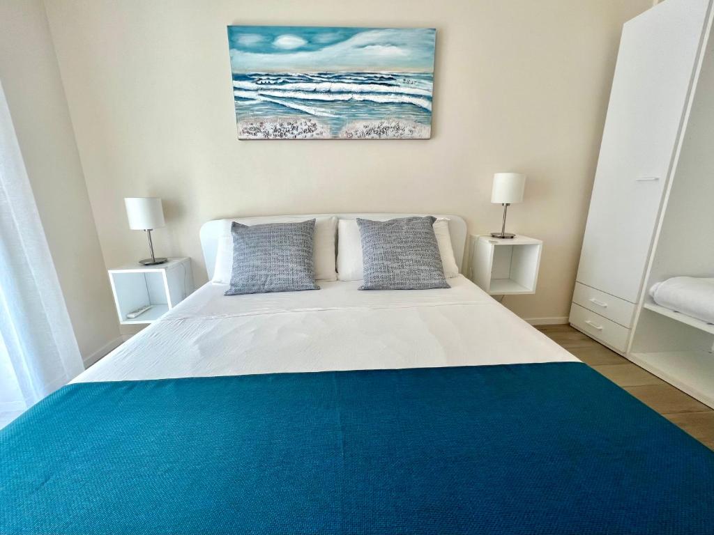 Posteľ alebo postele v izbe v ubytovaní B&B Amare POLIGNANO