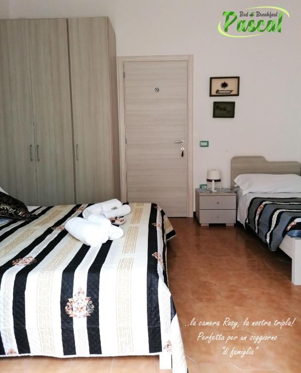 Postel nebo postele na pokoji v ubytování B&B Pascal