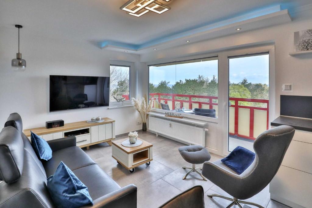 Posezení v ubytování Terrassenhaus Duhnen Wohnung 77