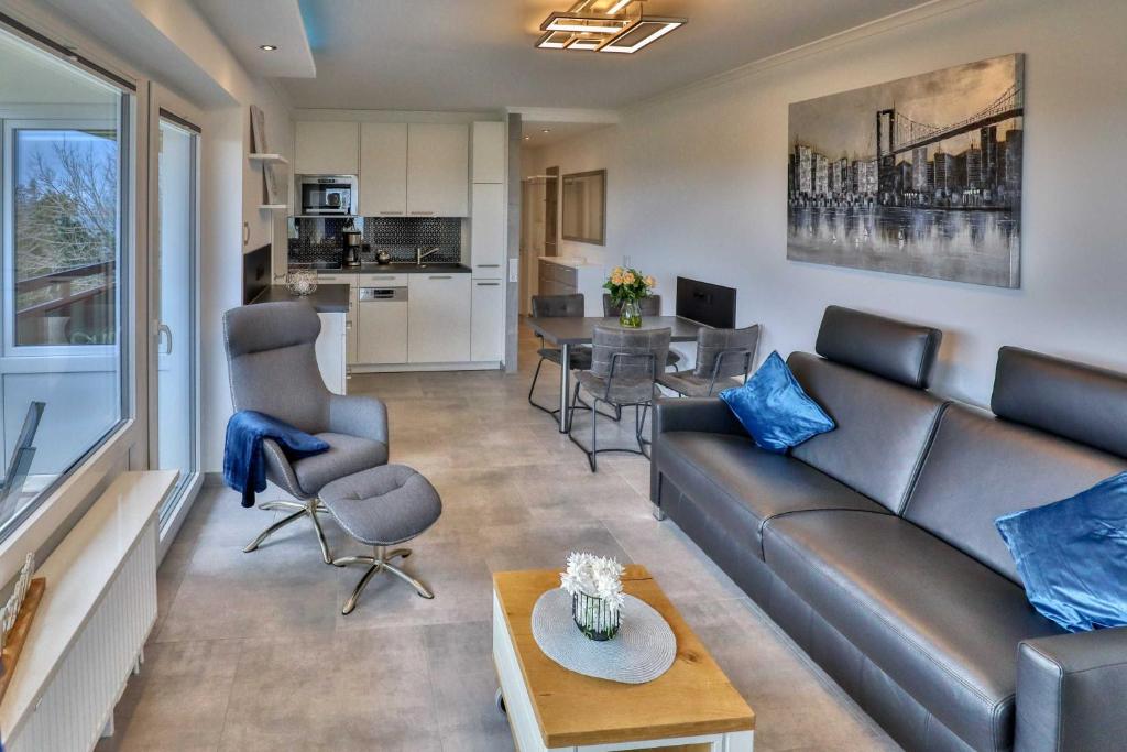 Posezení v ubytování Terrassenhaus Duhnen Wohnung 77