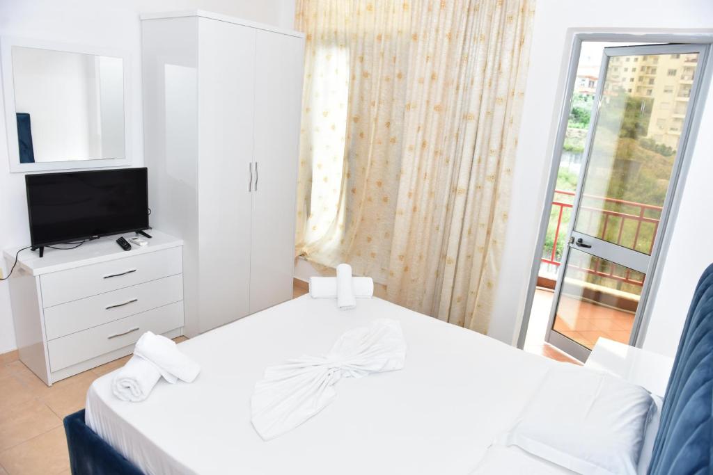 Postel nebo postele na pokoji v ubytování Vila Namiku