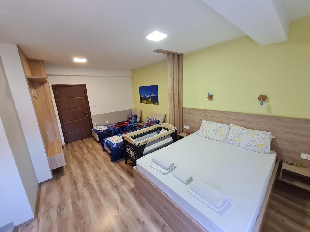 Postel nebo postele na pokoji v ubytování Bojana Apartment