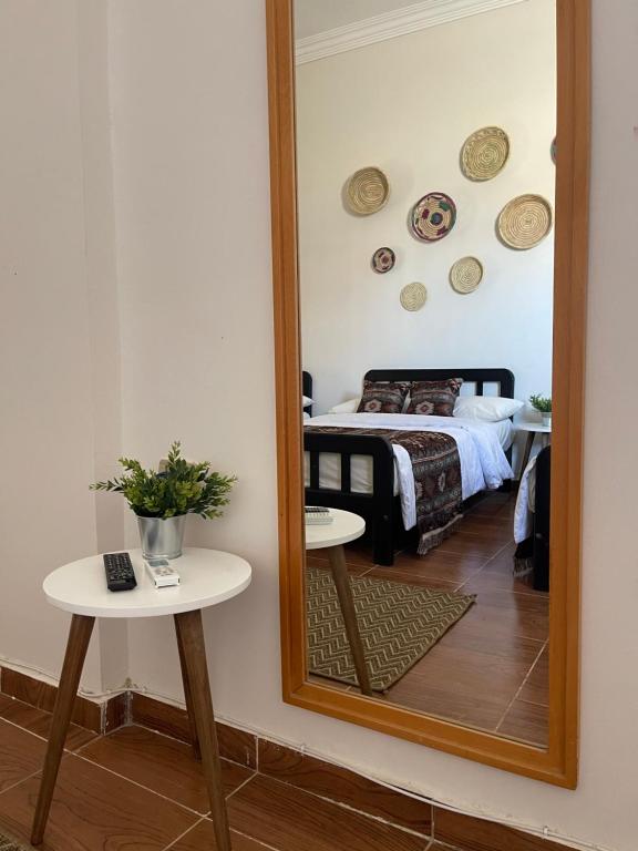 Postel nebo postele na pokoji v ubytování La Casa Guest House