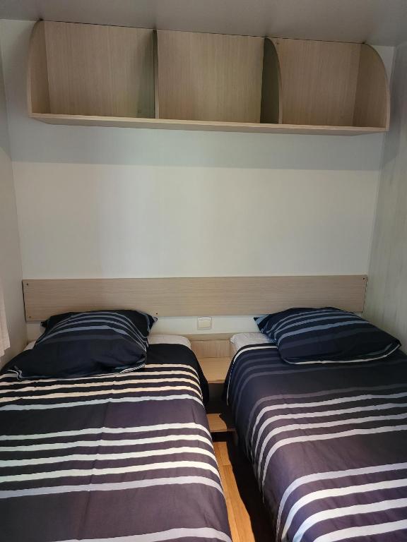 Postel nebo postele na pokoji v ubytování Camping Ixtila mobilhome Betzüla