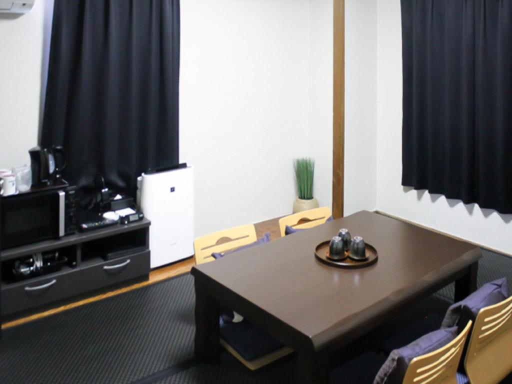 Kuchyň nebo kuchyňský kout v ubytování Hotel Livemax BUDGET Kanazawa-Idaimae
