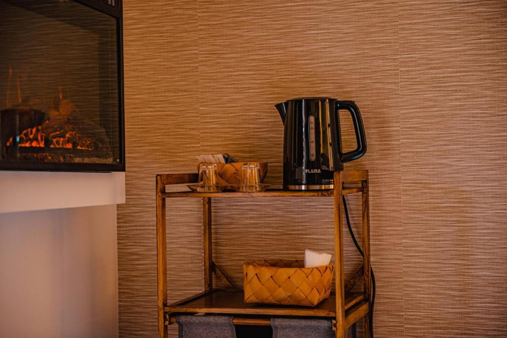 Příslušenství pro přípravu čaje a kávy v ubytování Seixomil - Casa de Campo Boutique Design