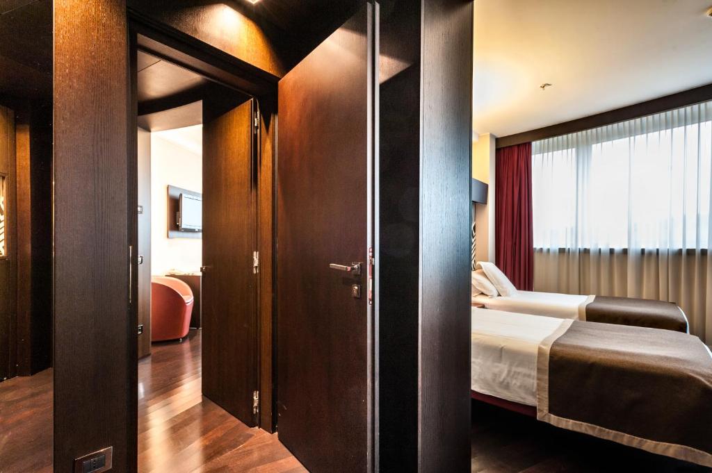 Posteľ alebo postele v izbe v ubytovaní Crowne Plaza Milan City by IHG