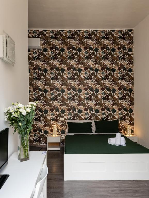 Łóżko lub łóżka w pokoju w obiekcie B&B Università