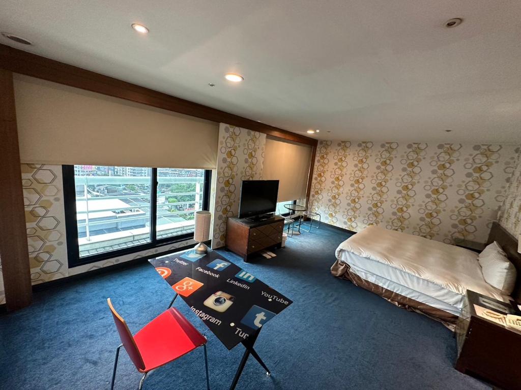 Postel nebo postele na pokoji v ubytování 喜客商旅 Seeker Hotel - Sanchong