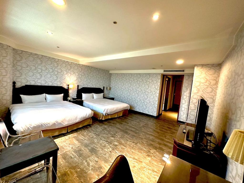 Postel nebo postele na pokoji v ubytování 喜客商旅 Seeker Hotel - Sanchong