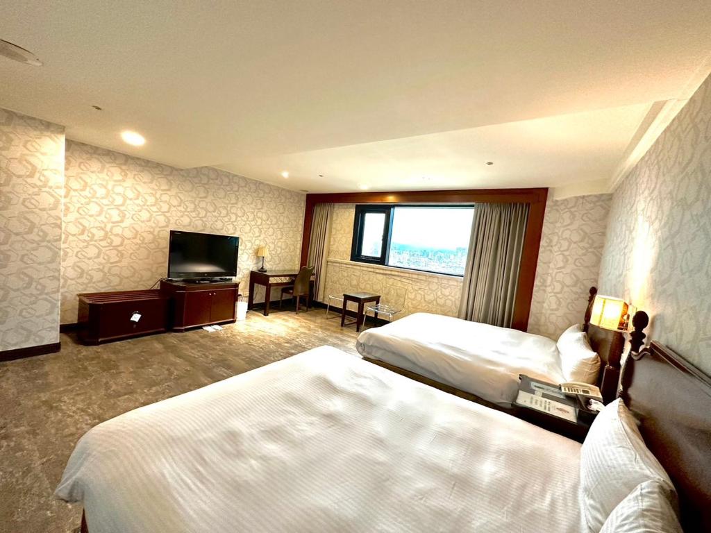 TV a/nebo společenská místnost v ubytování 喜客商旅 Seeker Hotel - Sanchong