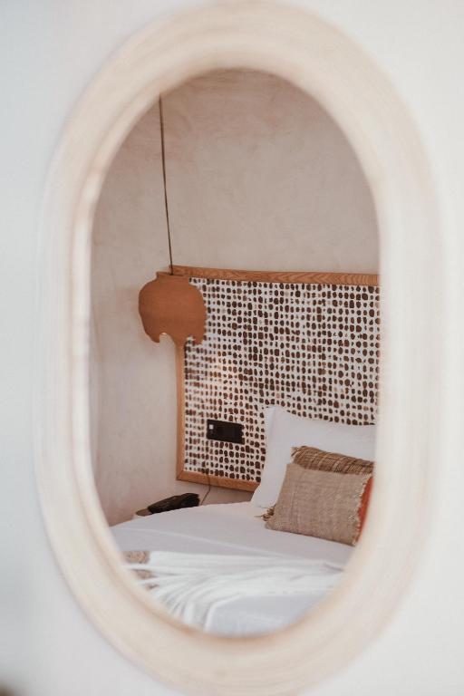 Llit o llits en una habitació de Lost Seaside Hotel