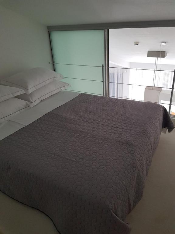 Postel nebo postele na pokoji v ubytování Apartments Fontana Zambratija