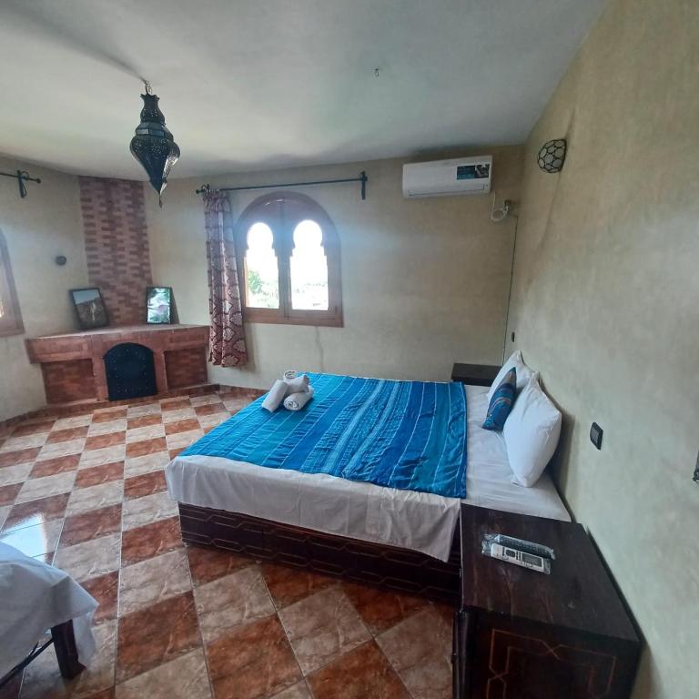 Letto o letti in una camera di Maison d´hôtes Amazir