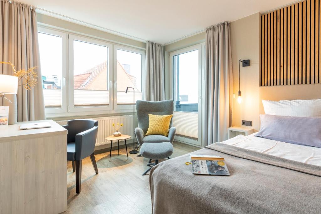 Postel nebo postele na pokoji v ubytování Hotel Tide42