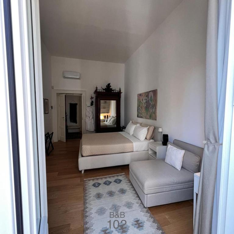 Postel nebo postele na pokoji v ubytování B&B 102