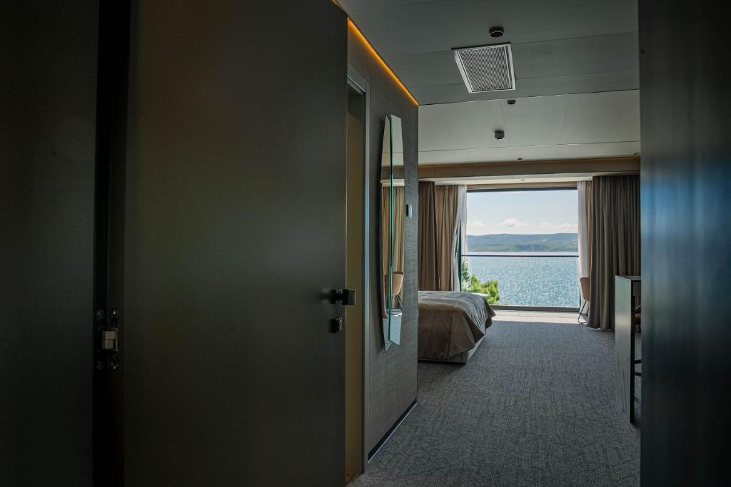 Postel nebo postele na pokoji v ubytování Hotel Medistone