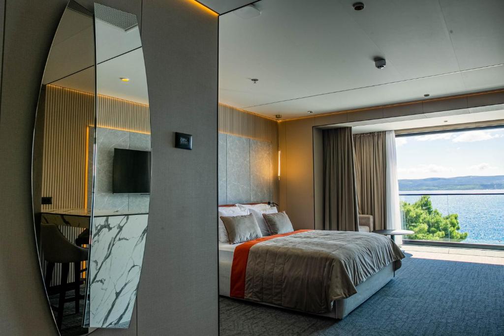 Postel nebo postele na pokoji v ubytování Hotel Medistone