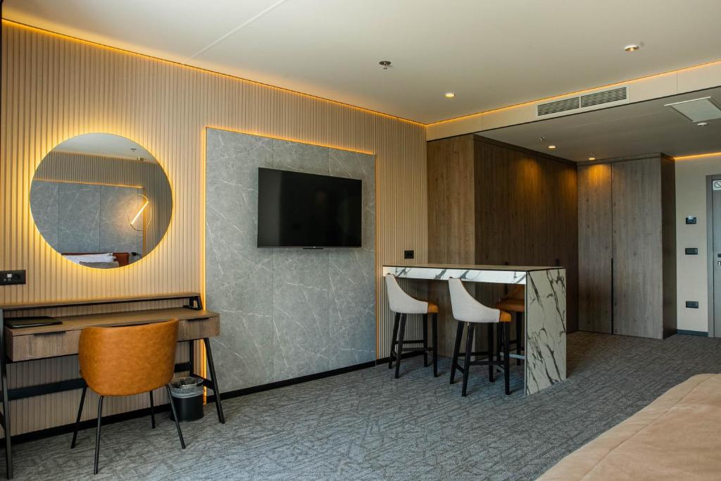 TV a/nebo společenská místnost v ubytování Hotel Medistone