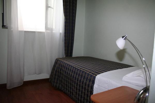 Postel nebo postele na pokoji v ubytování B&B Luna Blu