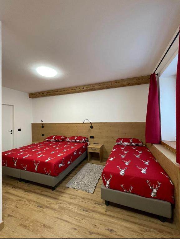 Postel nebo postele na pokoji v ubytování C’era una volta un Re…
