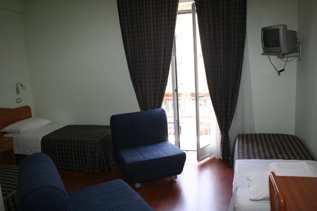 TV a/nebo společenská místnost v ubytování B&B Luna Blu