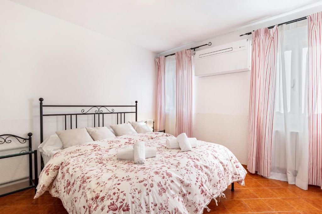 Säng eller sängar i ett rum på Ae Botti Apartment