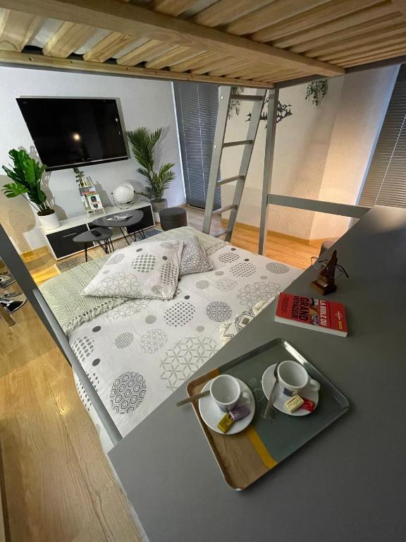 Postel nebo postele na pokoji v ubytování Au Doubs Village