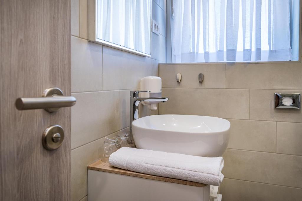 Kopalnica v nastanitvi Hotel Vicko