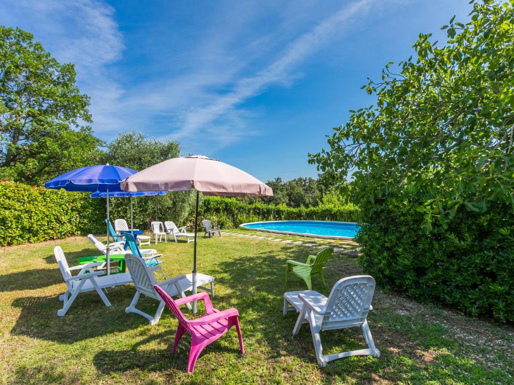 The swimming pool at or close to Apartment Gardenia by Interhome