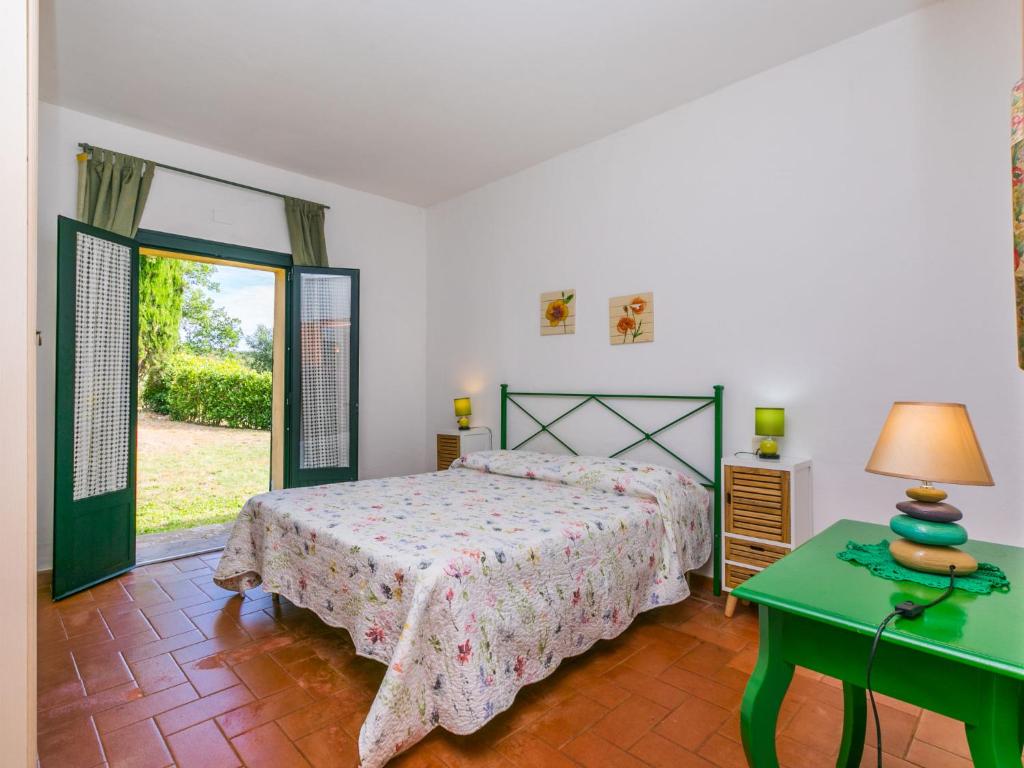 A bed or beds in a room at Apartment Gardenia by Interhome