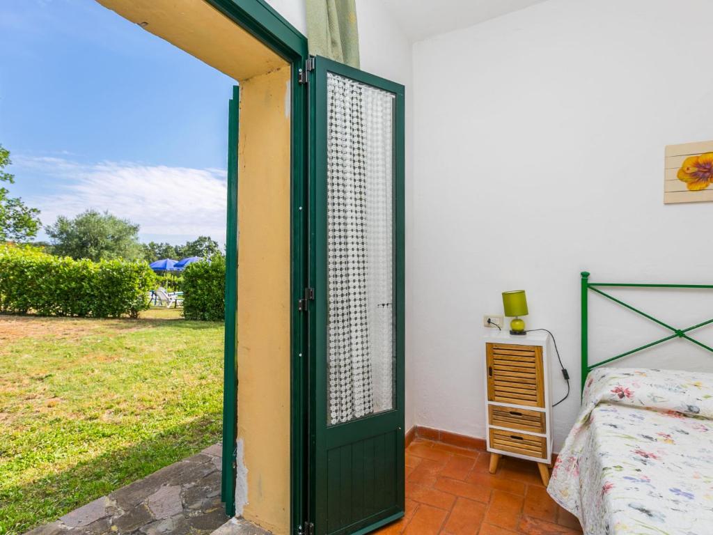 A bed or beds in a room at Apartment Gardenia by Interhome