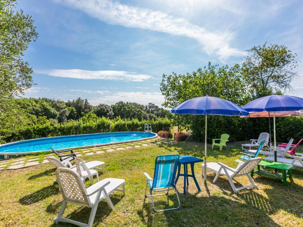 The swimming pool at or close to Apartment Gardenia by Interhome