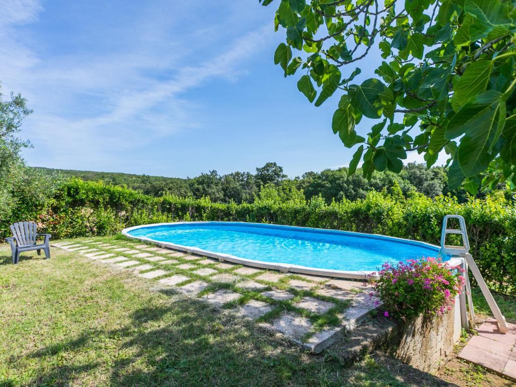 The swimming pool at or close to Apartment Gardenia by Interhome