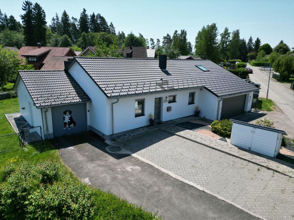 an aerial view of a white house at Holiday Home 4 Pfoten by Interhome in Dittishausen