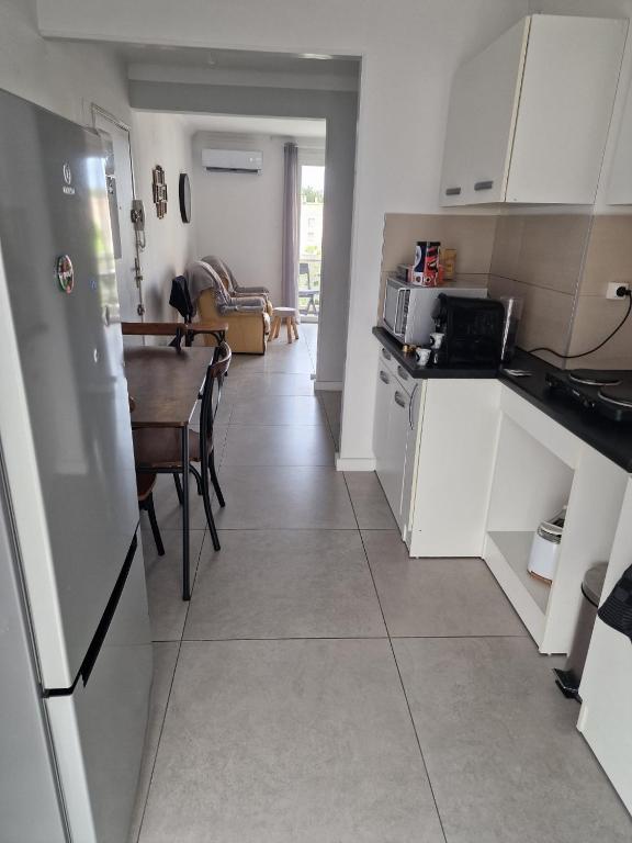 Kuchyňa alebo kuchynka v ubytovaní Appparement T3 Marseille 13009