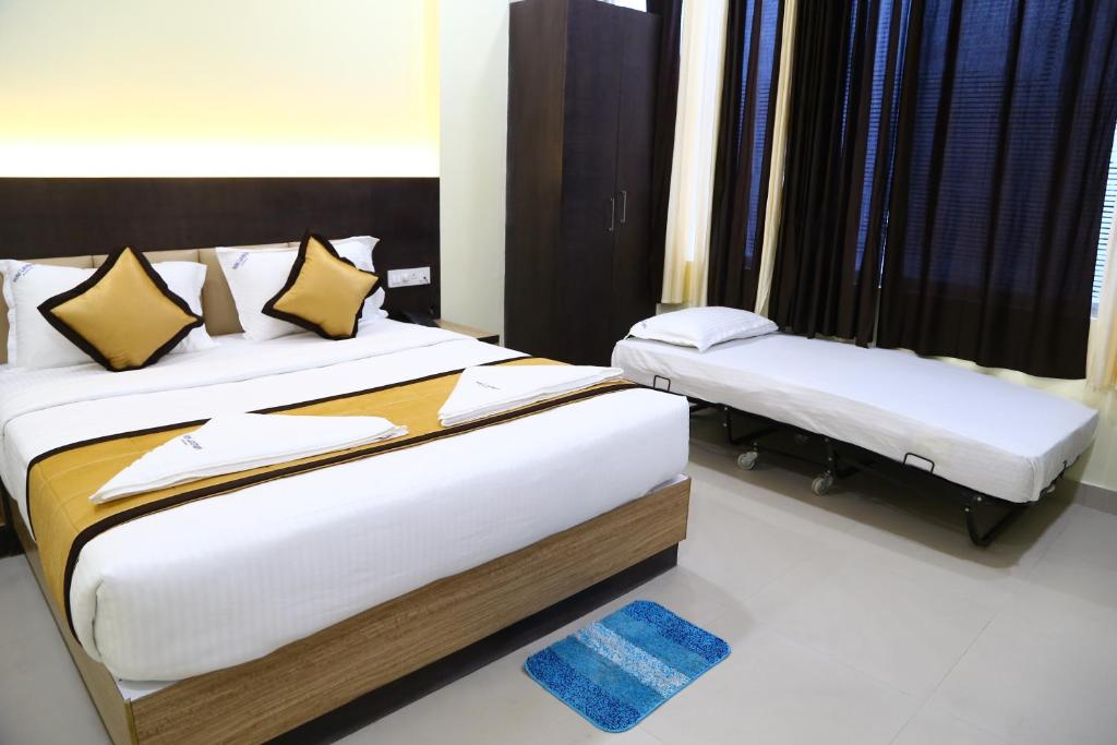 Cama o camas de una habitación en Hotel Landmark