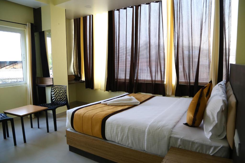 Cama o camas de una habitación en Hotel Landmark