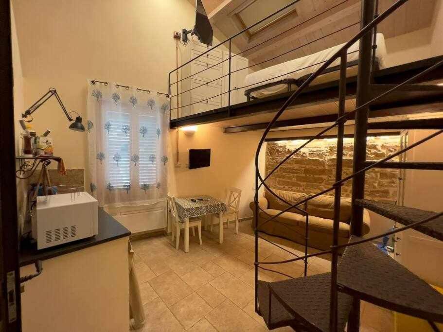 Posteľ alebo postele v izbe v ubytovaní Suite Minerva 10 steps from Piazza Civica