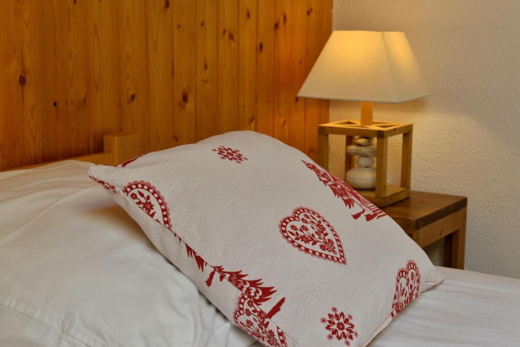 Postel nebo postele na pokoji v ubytování Résidence Joséphine