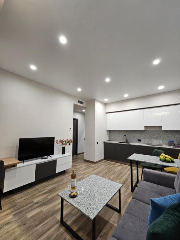 TV a/nebo společenská místnost v ubytování Orion ApartHotel