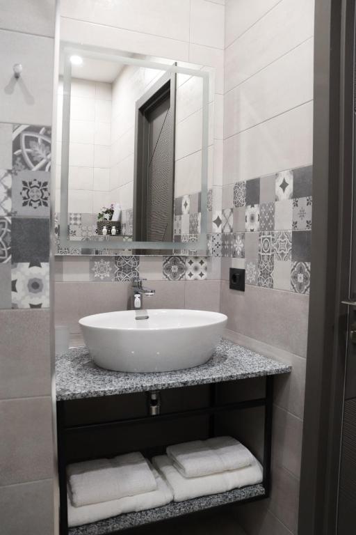 Koupelna v ubytování Orion ApartHotel